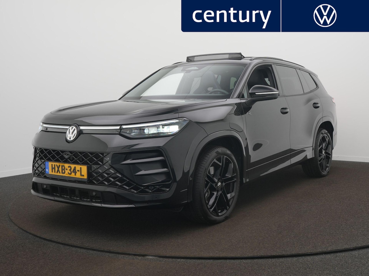 Volkswagen Tayron - 1.5 eHybrid R-Line Edition / Panodak / 360 Camera / Elek. Trekhaak / Massage - AutoWereld.nl