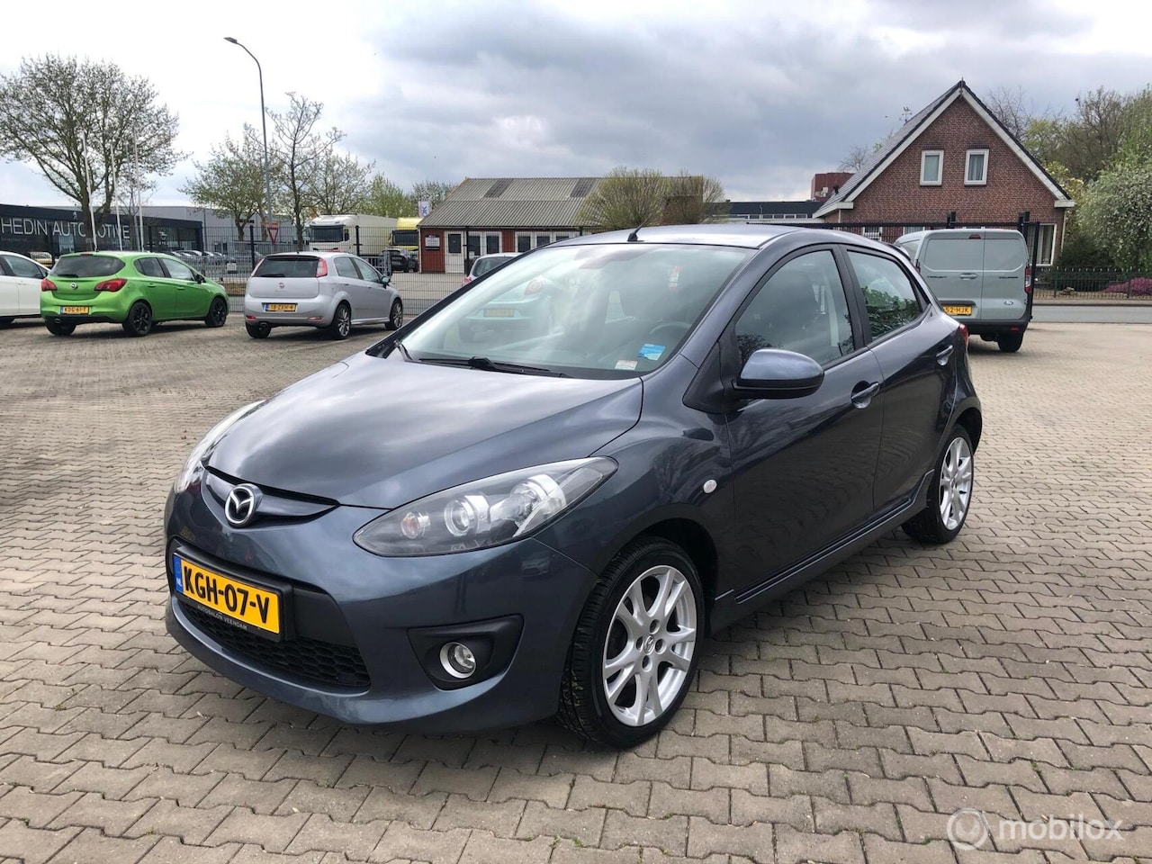 Mazda 2 - 1.3 TS SPORT AIRCO ELL PAKK LMV - AutoWereld.nl