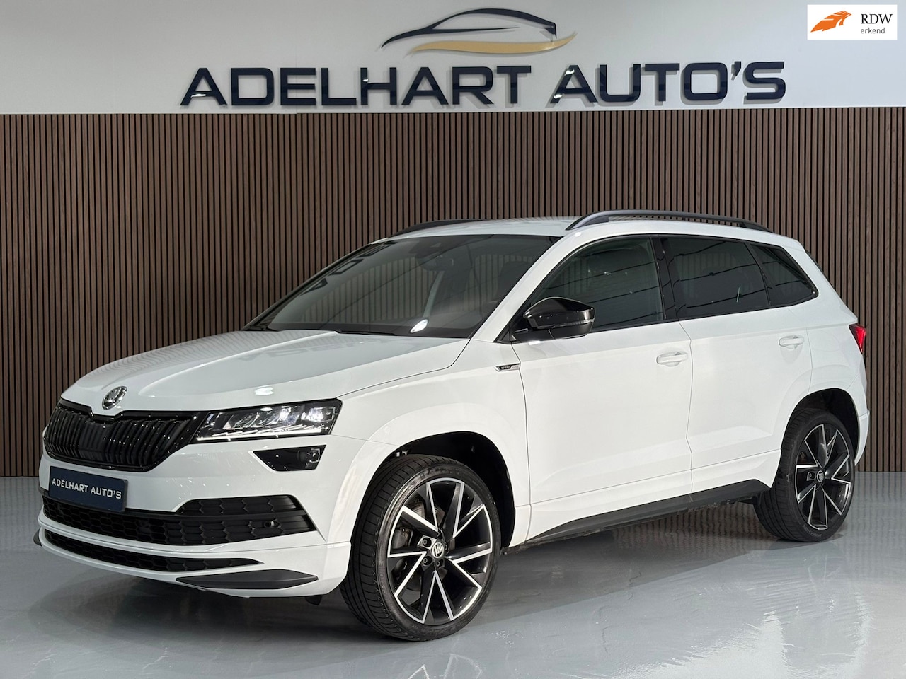 Skoda Karoq - 1.5 TSI ACT Sportline Business Automaat DSG / Navigatie full map / Cruise control / Climat - AutoWereld.nl