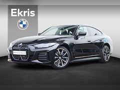 BMW i4 - eDrive40 High Executive 84 kWh M Sport Pro / Glazen schuif-/kanteldak / Harman Kardon / St
