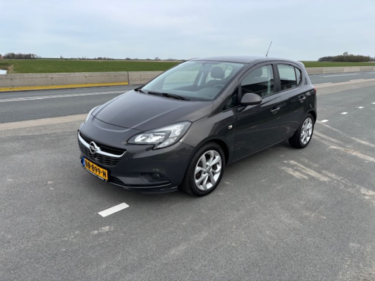 Opel Corsa - 1.4 66KW/90PK 5D CRUISE TREK.H AIRCO - AutoWereld.nl