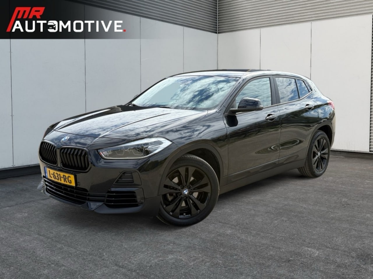BMW X2 - sDrive 18i Executive - Stoelverwarming, Trekhaak, PDC, Navi - AutoWereld.nl