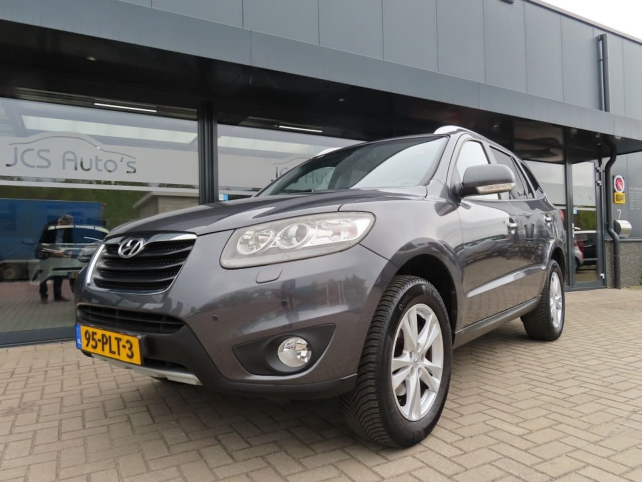 Hyundai Santa Fe - 2.4i Style 7Pers. Ecc Cruise Leder Trekhaak 2011 - AutoWereld.nl
