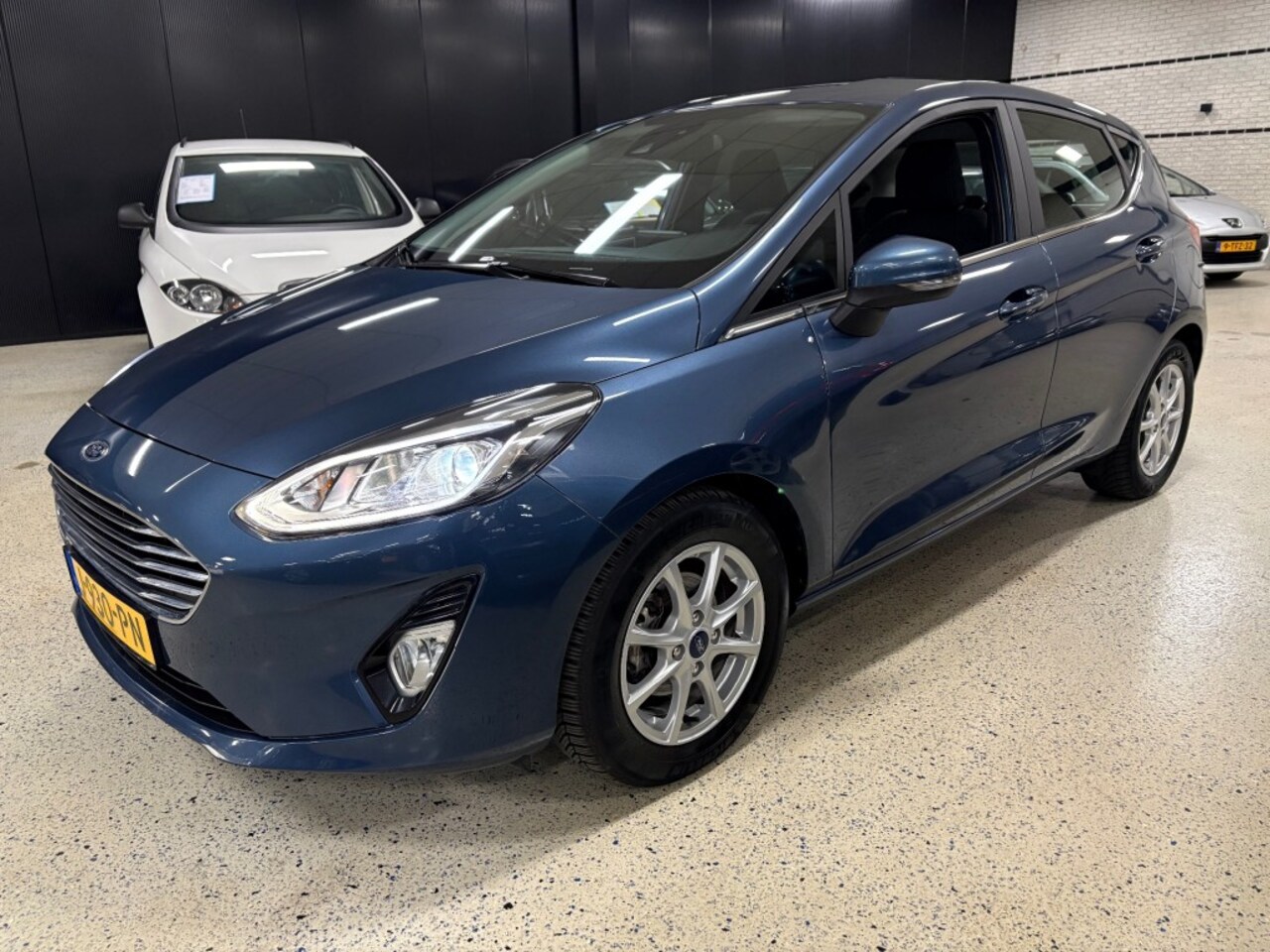 Ford Fiesta - 1.0 Ecob Hybrid 135pk Titanium Navigatie PDC Apple Android - AutoWereld.nl