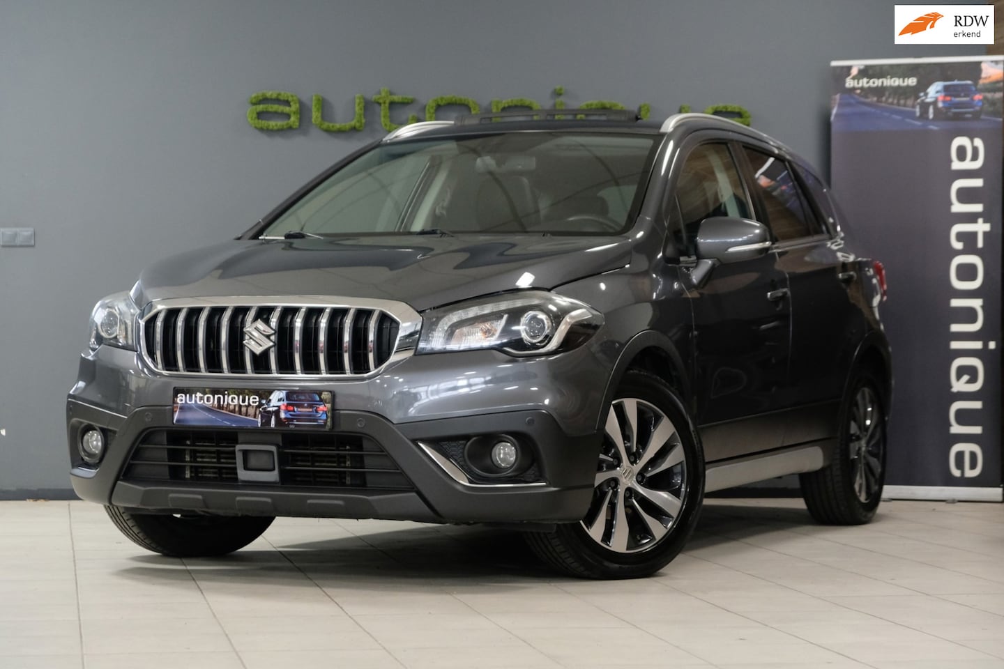Suzuki S-Cross - 1.4 Boosterjet High Executive *PANORAMADAK* Leder/Automaat/Navi/Camera - AutoWereld.nl
