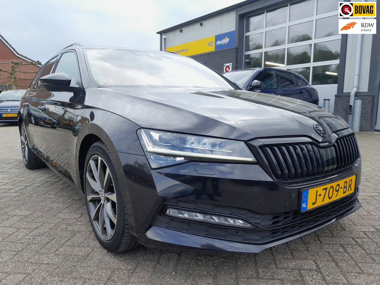 Skoda Superb Combi - 1.5 TSI ACT Sportline Business - Automaat - Camera - AutoWereld.nl
