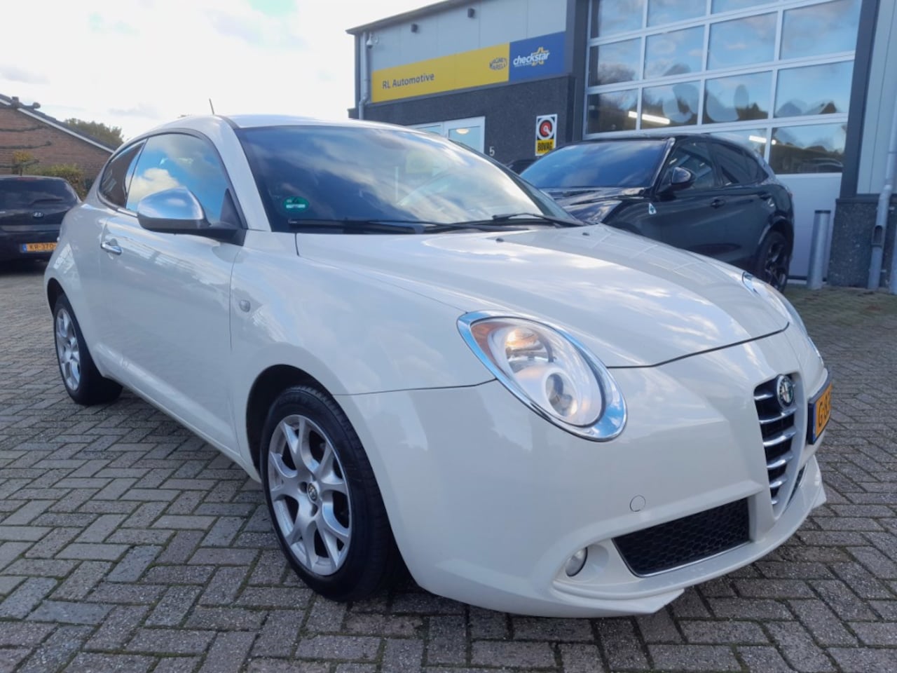 Alfa Romeo MiTo - 1.4 Distinctive - PDC - Nieuwe apk - AutoWereld.nl