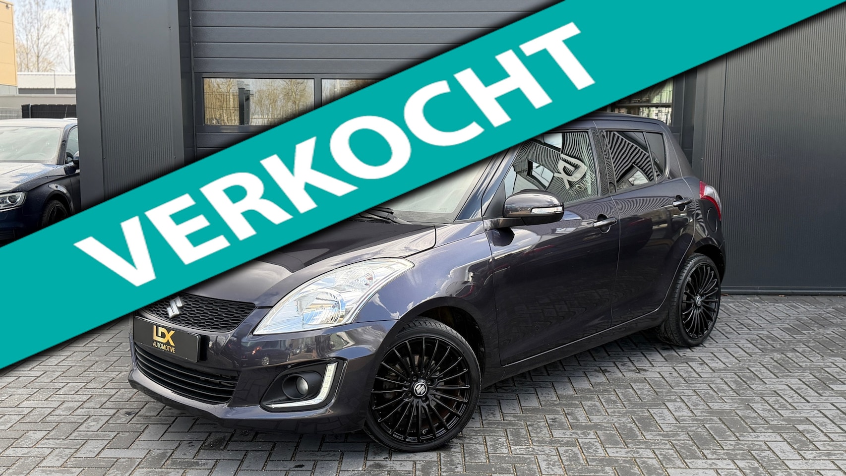 Suzuki Swift - 1.2 Exclusive EASSS Airco|Navi|Cruise - AutoWereld.nl