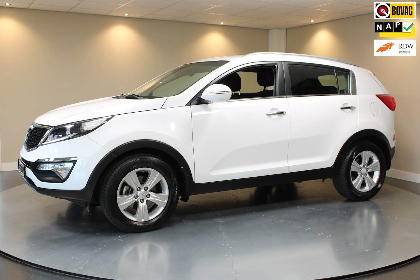 Kia Sportage - 1.6 GDI ComfortLine *Trekhaak* All-seasons|Camera|Navi|Cruise|NAP - AutoWereld.nl