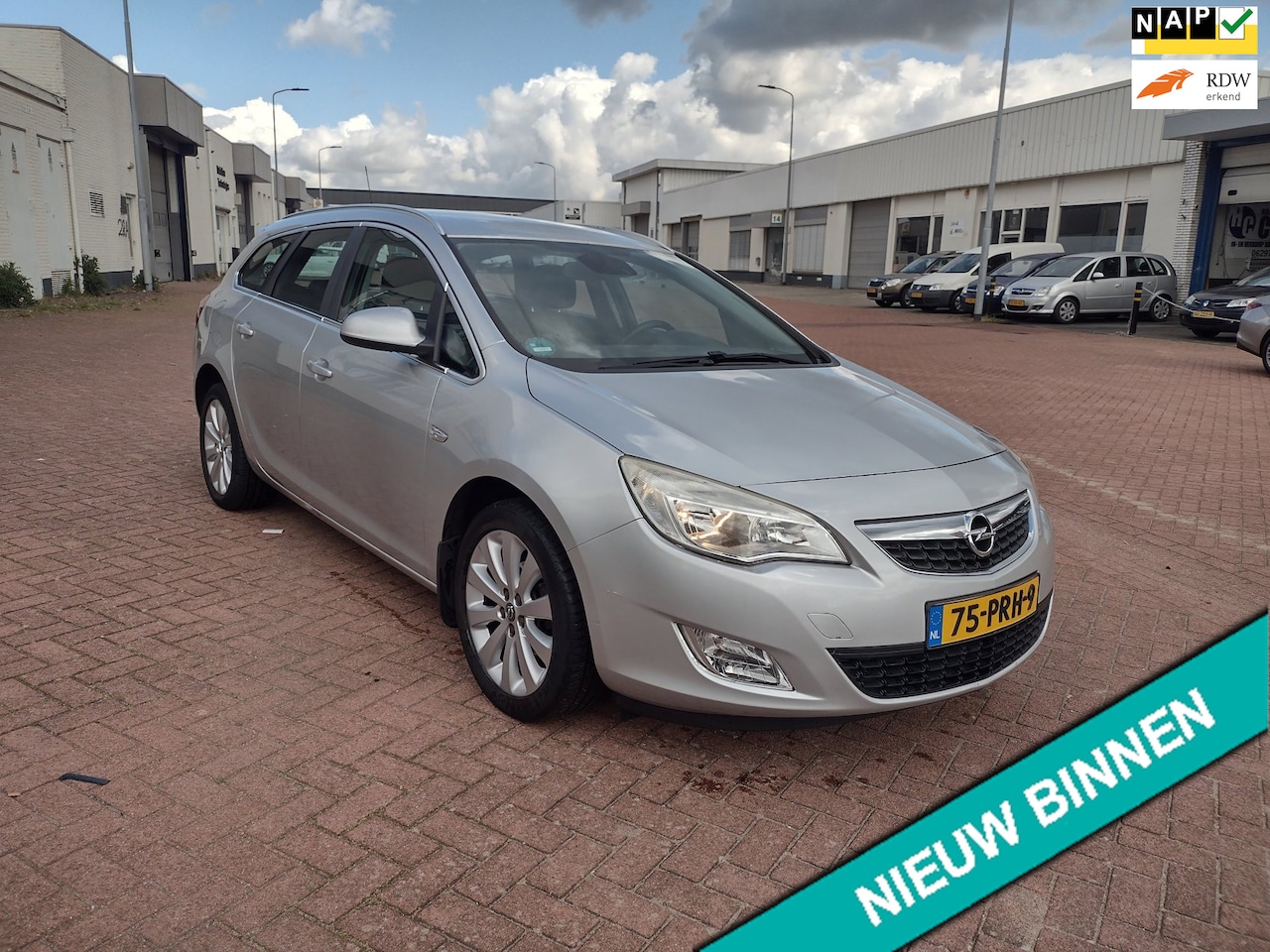 Opel Astra Sports Tourer - 1.4 Cosmo MOOIE AUTO BEL 0619590613 5 DRS AIRCO APK 11-03-2027 - AutoWereld.nl