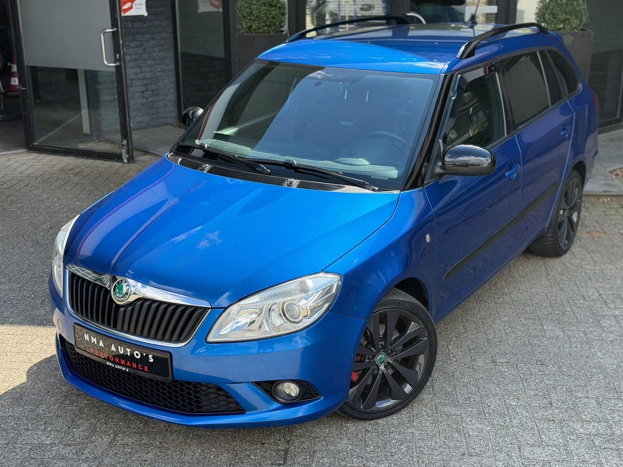 Skoda Fabia Combi - 1.4 TSI RS 180PK / CRUISE / NAVI / BLUETOOTH / STOELVERWARMING - AutoWereld.nl