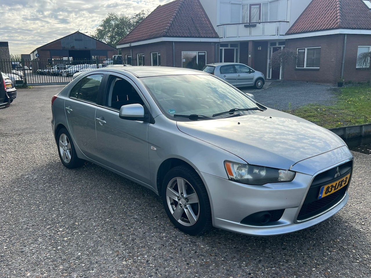 Mitsubishi Lancer Sportback - 1.5 Edition One met schade - AutoWereld.nl