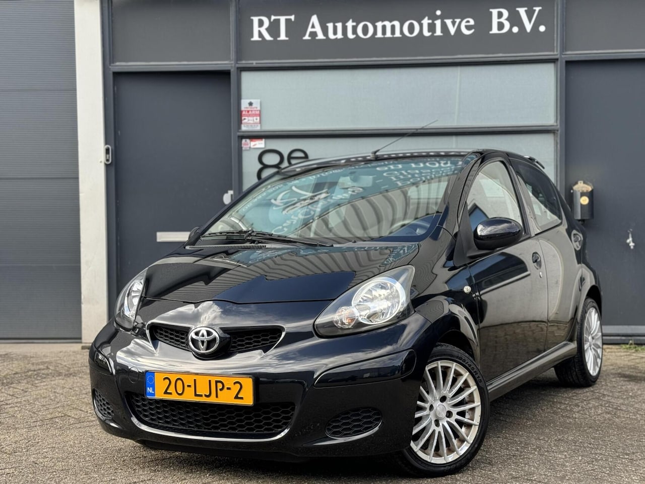 Toyota Aygo - 1.0-12V Dealer OH Airco / LM Velgen 5Drs - AutoWereld.nl