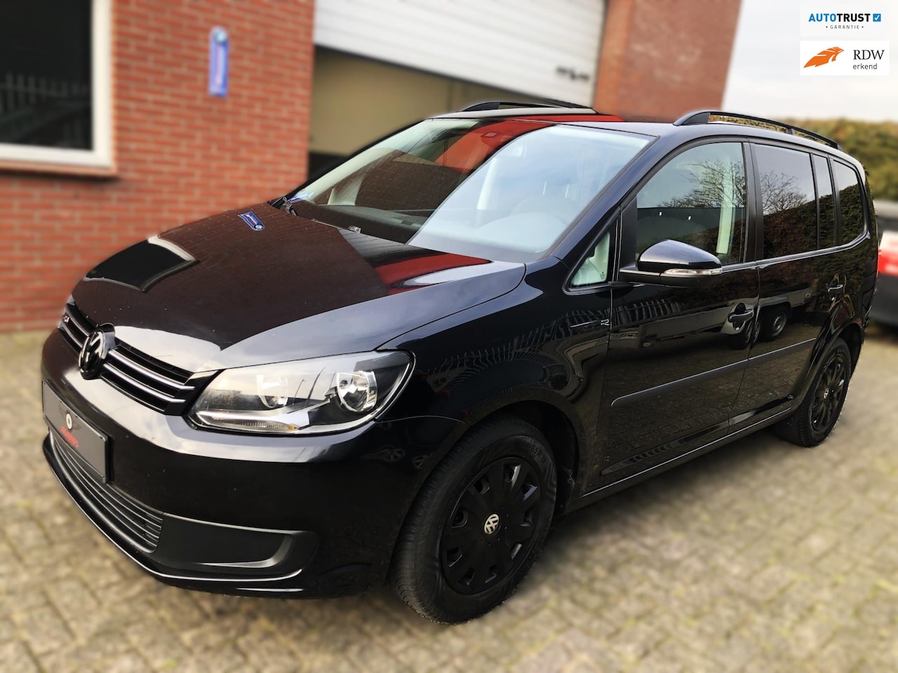 Volkswagen Touran - 1.4 TSI 140pk/NAVI/7 zits/Stoelverw/PDC - AutoWereld.nl