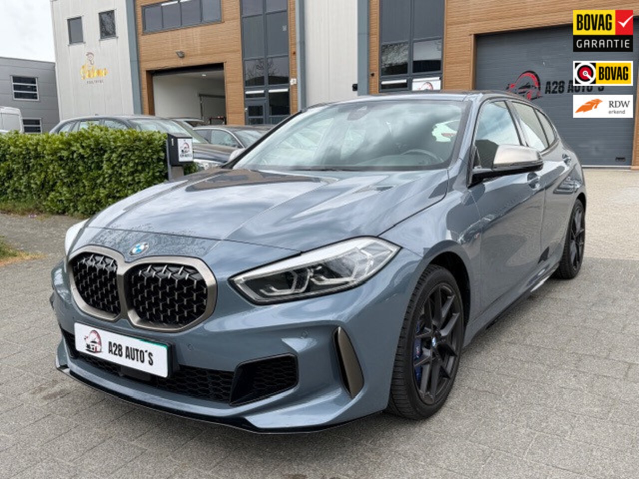 BMW 1-serie - M135i xDrive Executive | Head up CarPlay| Automaat | NAP | Memory - AutoWereld.nl
