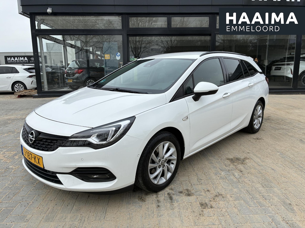 Opel Astra Sports Tourer - 1.2T 130Pk Elegance | Climate control | Navigatie | Camera | Elektrisch Pakket | Trekhaak - AutoWereld.nl