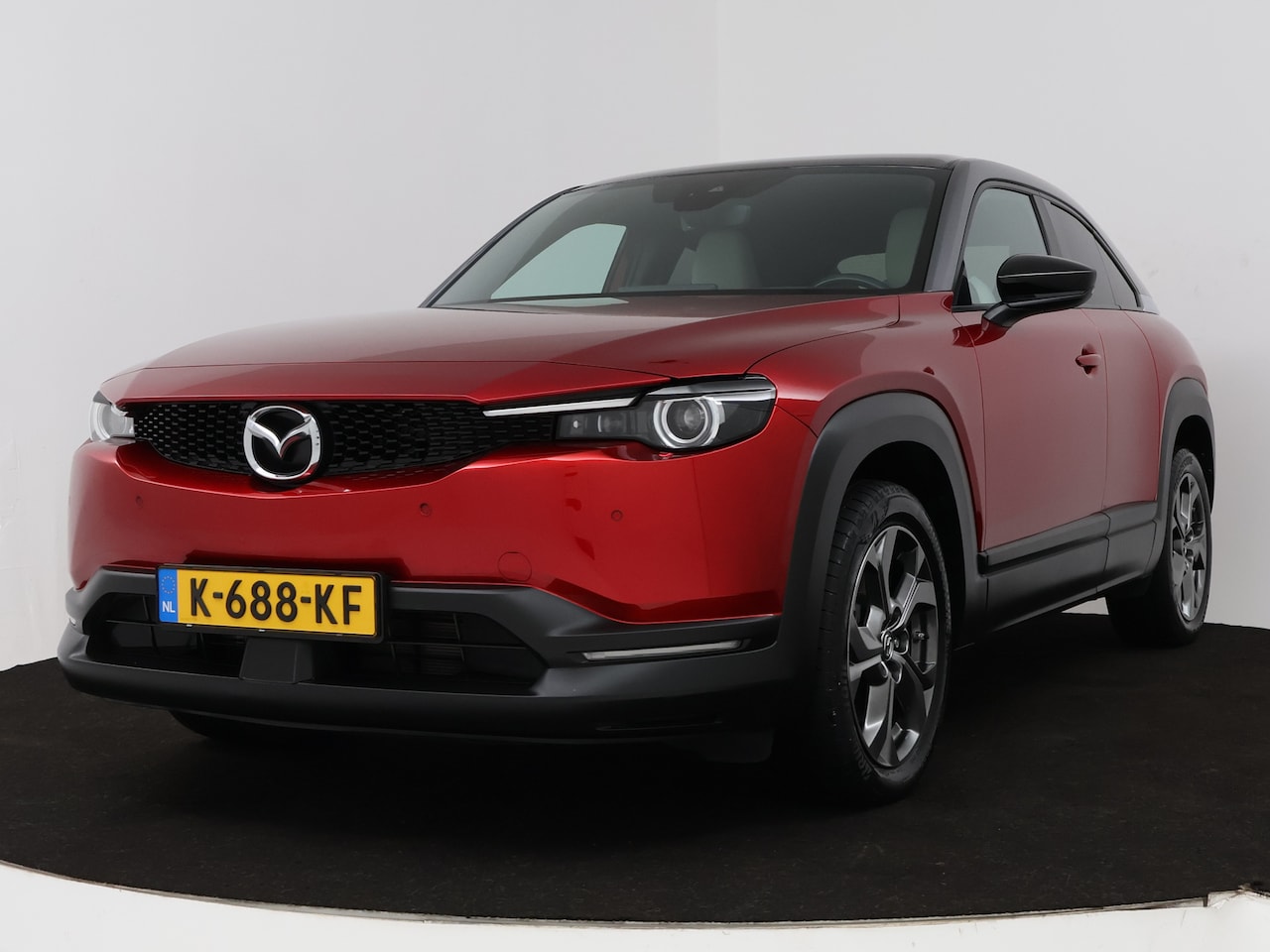 Mazda MX-30 - e-SkyActiv 145 First Edition 36 kWh Navigatie | Climate control | Elektr. verstelbare best - AutoWereld.nl