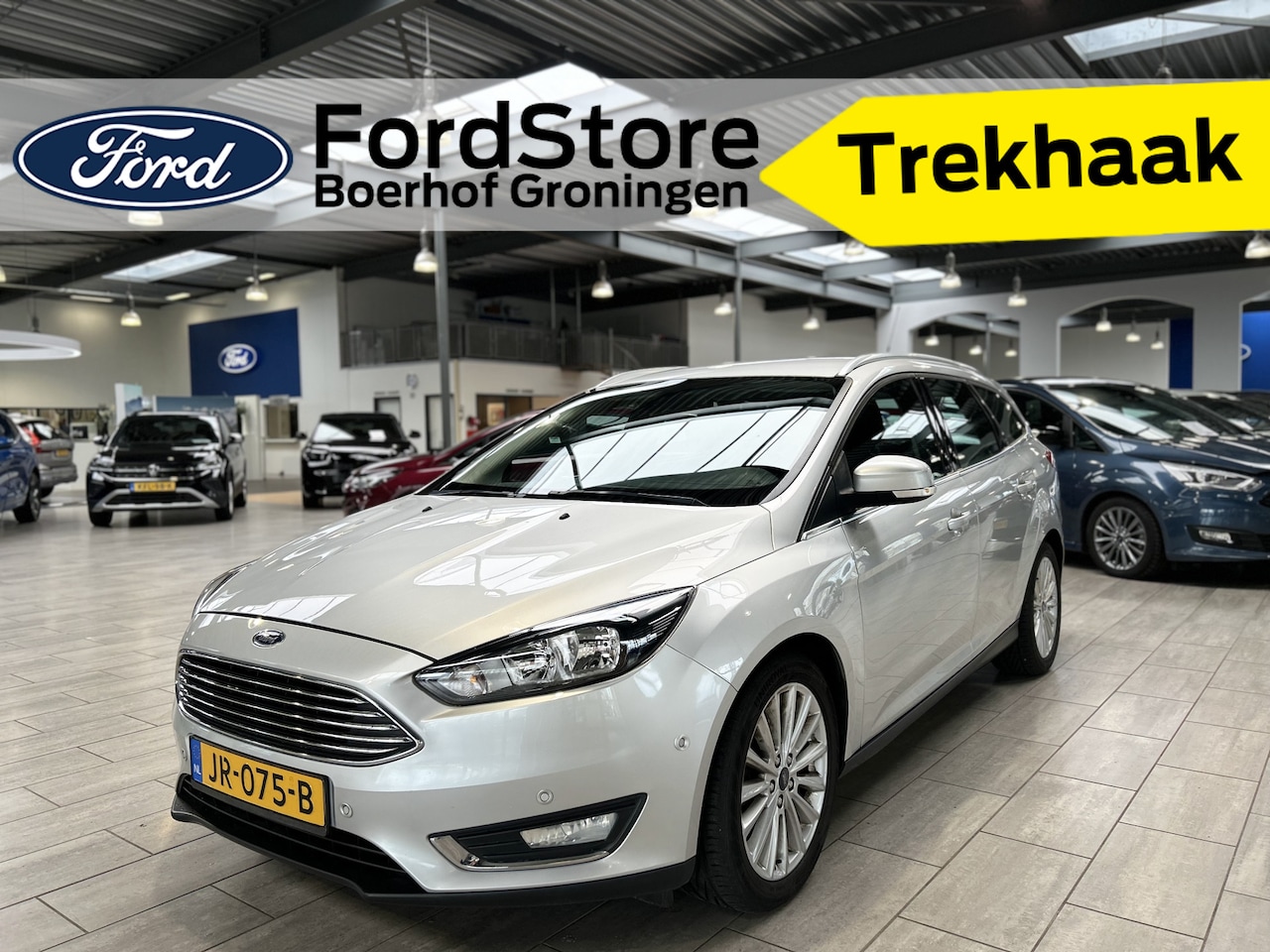 Ford Focus Wagon - 125pk Titanium | Nwe. distributieriem | Trekhaak | Voorruit verwarmd | Camera | Clima | Cr - AutoWereld.nl