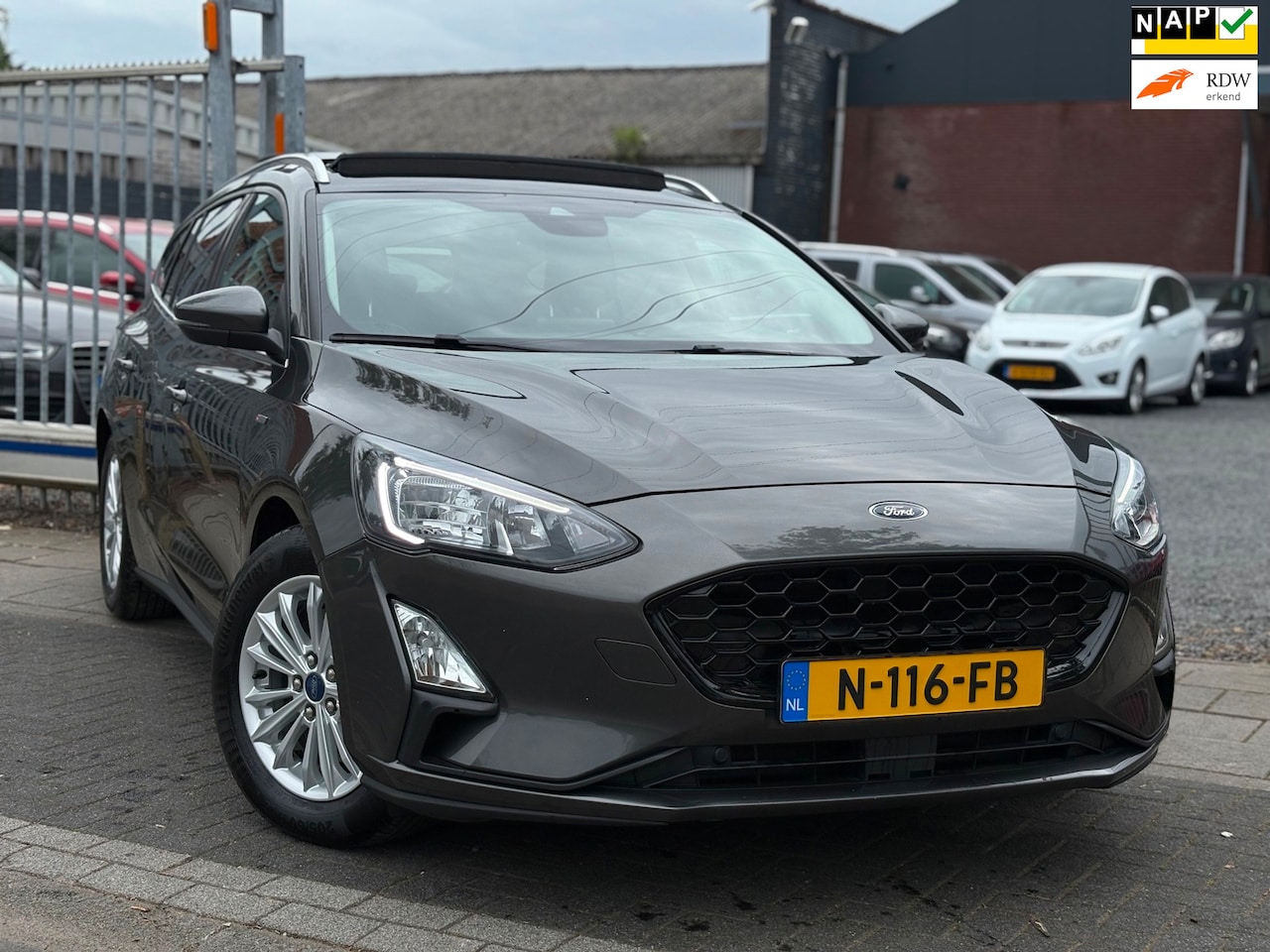 Ford Focus Wagon - 1.0 EcoBoost Hybrid Titanium X Business | Panoramadak | Trekhaak | B&O | A.Camera | LED | - AutoWereld.nl