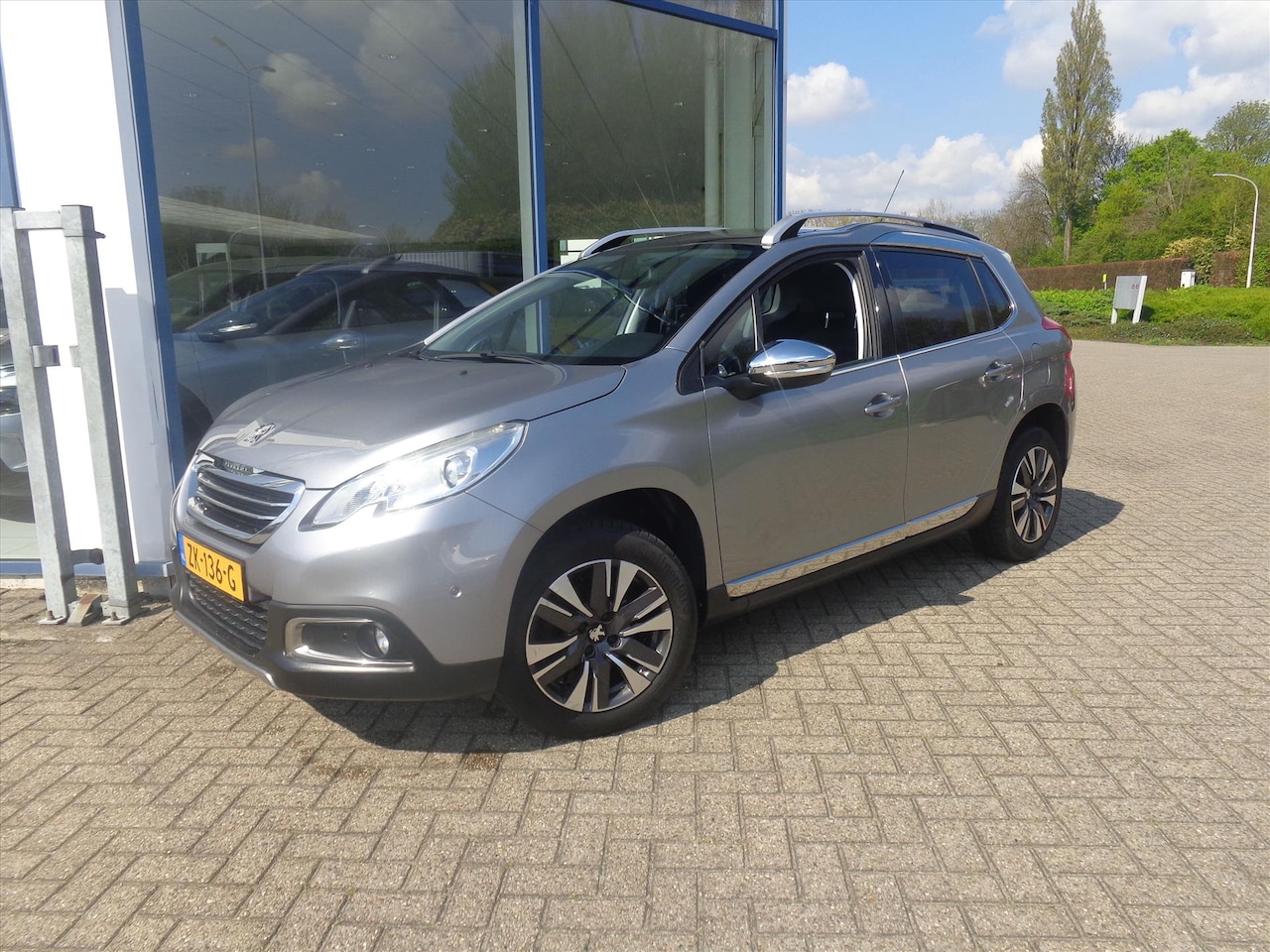 Peugeot 2008 - 1.2 e-VTi 2-Tronic 82pk Allure climate controle navi - AutoWereld.nl