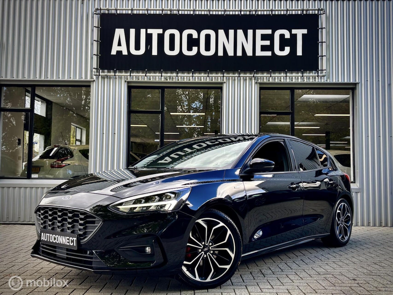 Ford Focus - 1.5 EcoBoost ST Line. AUTOMAAT, NAVI, CRUISE, CLIMA, XENON - AutoWereld.nl