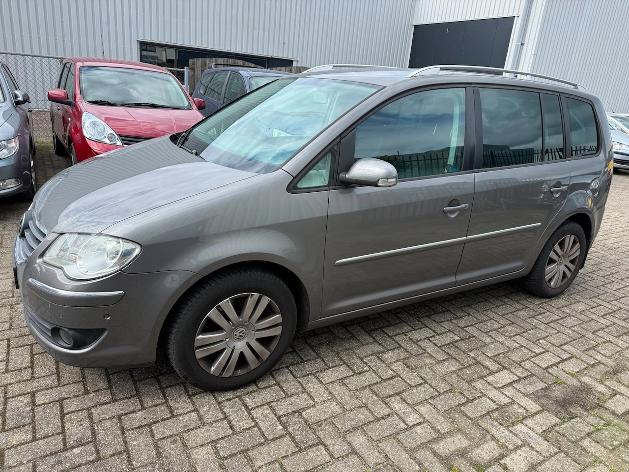 Volkswagen Touran - 2.0 TDI Highline Business 2.0 TDI Highline Business - AutoWereld.nl