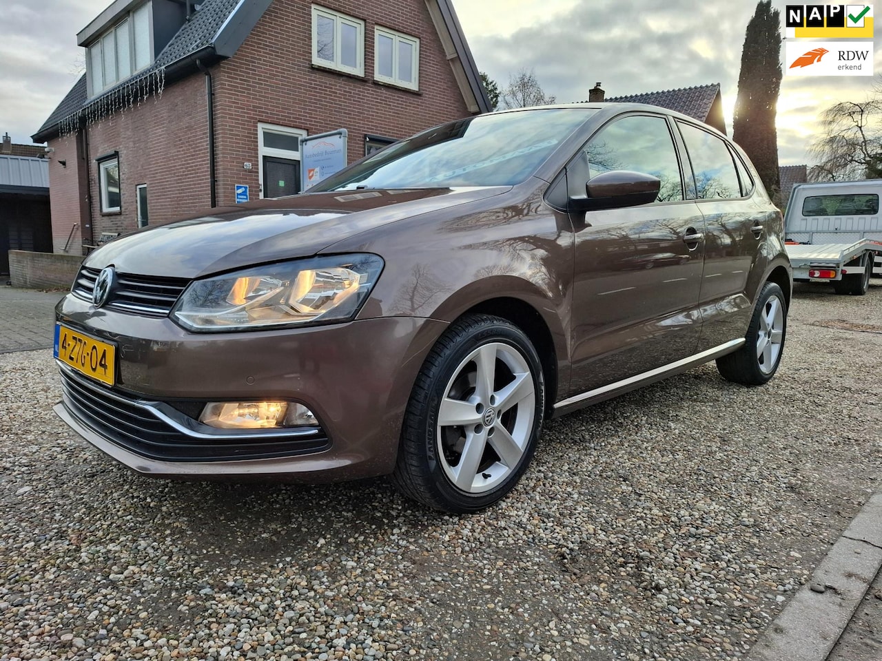 Volkswagen Polo - 1.2 TSI Highline automaat 1e eig airco cruise navigatie etc - AutoWereld.nl