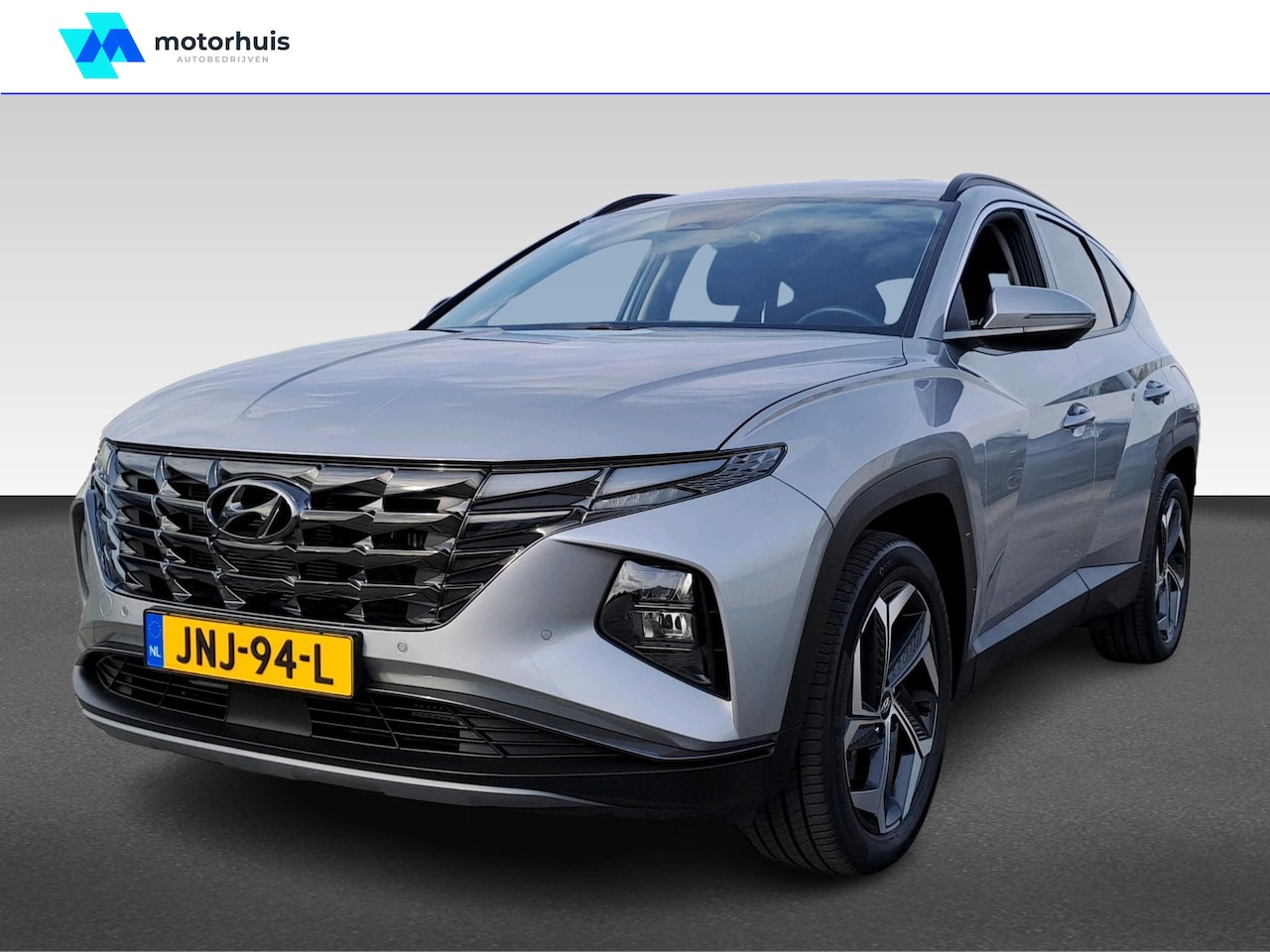 Hyundai Tucson - 1.6 T-GDi PHEV 265pk AWD Premium AUTOMAAT NAVI LED CAMERA WINTERPACK | Achterklep, automat - AutoWereld.nl