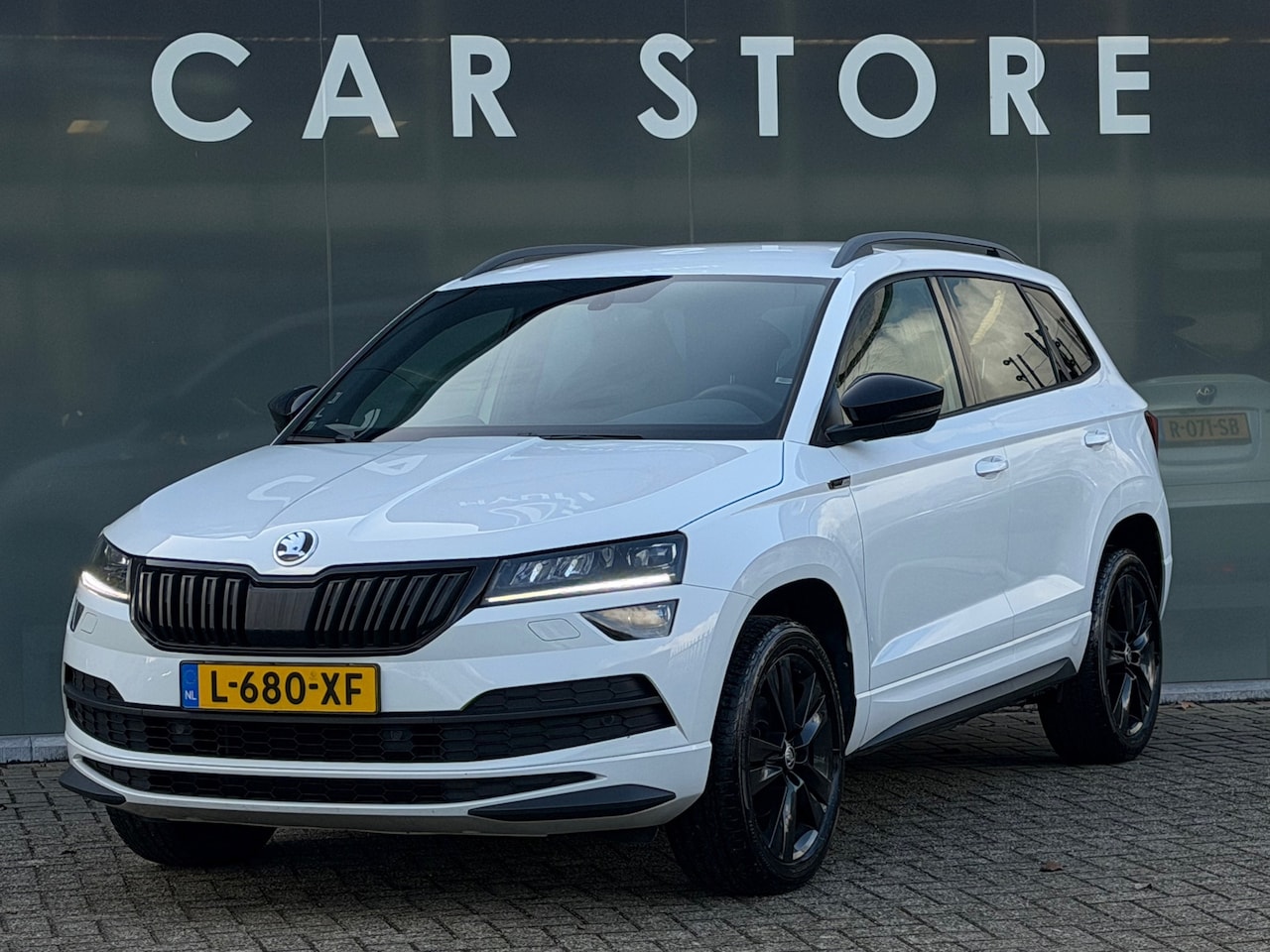 Skoda Karoq - 1.5 TSI DSG 150PK Sportline Stoelverwarming - AutoWereld.nl