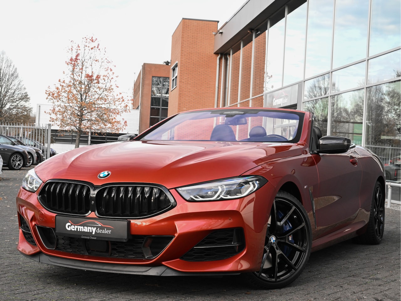 BMW 8-serie - M850i 531pk xDrive High Executive Sunset Orange 4W Sturing Carbon Core - AutoWereld.nl