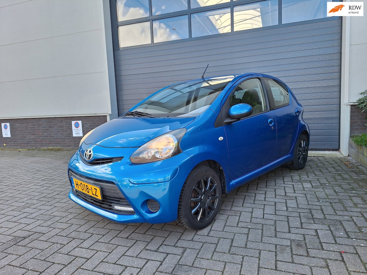 Toyota Aygo - | 1.0 VVT-i Dynamic Orange | Airco | Nieuwe koppeling | Lage kilometerstand | - AutoWereld.nl