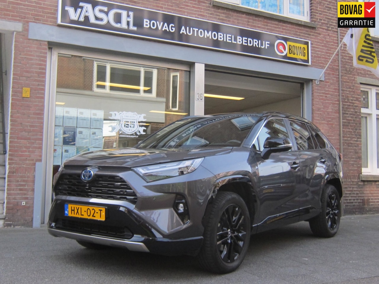 Toyota RAV4 - 2.5 Hybrid Business Plus Bearlock Bi-Tone All in prijs - AutoWereld.nl