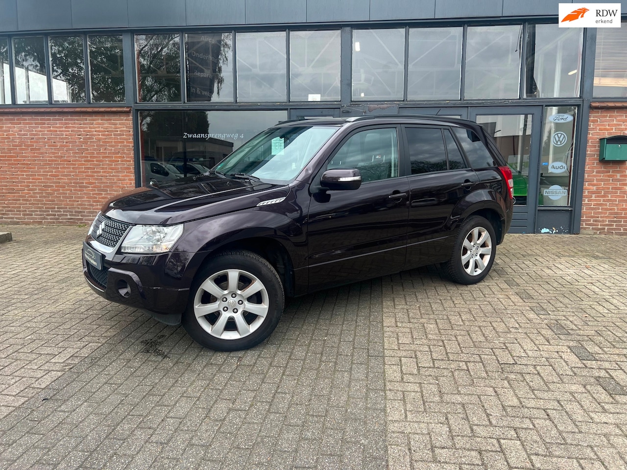 Suzuki Grand Vitara - 2.4 High Executive 2.4 High Executive, Airco, Stoelverwarming, Leer, Pano, 4X4 - AutoWereld.nl