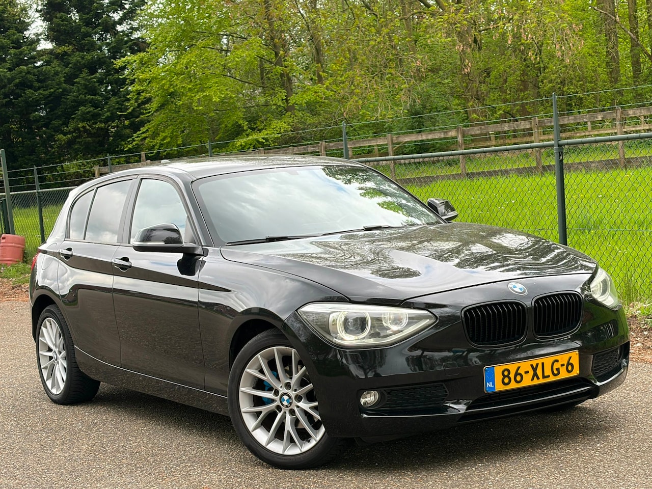 BMW 1-serie - 116i Business+ /Automaat/Xenon/Navi/ - AutoWereld.nl