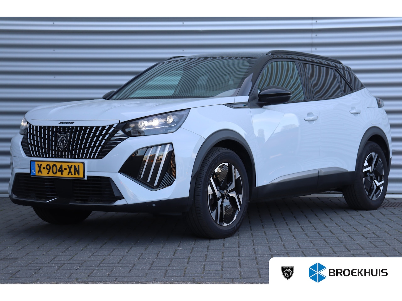 Peugeot e-2008 - 54KWH 156PK GT PACK AUTOMAAT / NAVI / LEDER / CLIMA / LED / PDC / 17" LMV / KEYLESS / ALCA - AutoWereld.nl