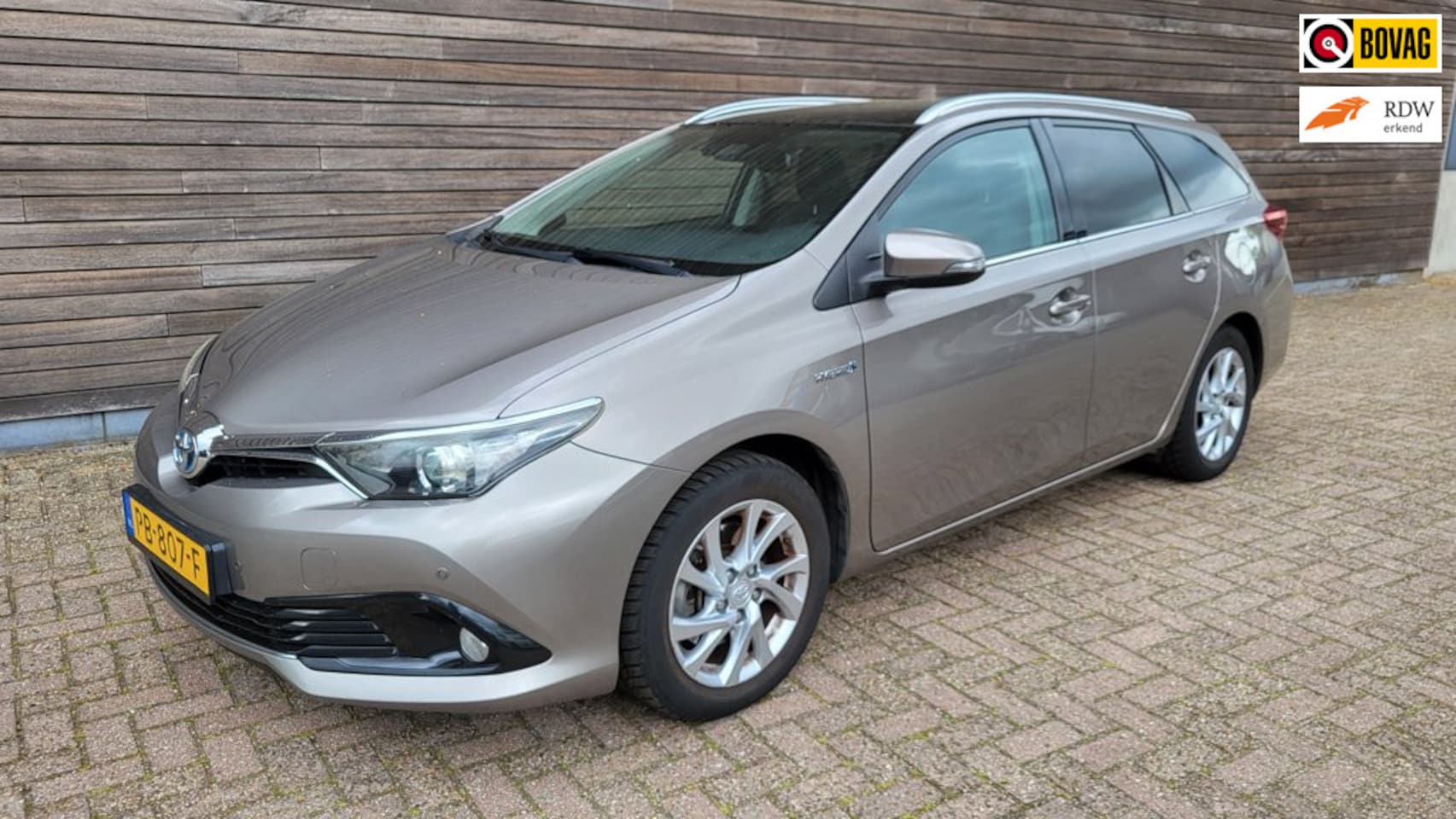 Toyota Auris Touring Sports - 1.8 Hybrid Lease panorama dak - AutoWereld.nl