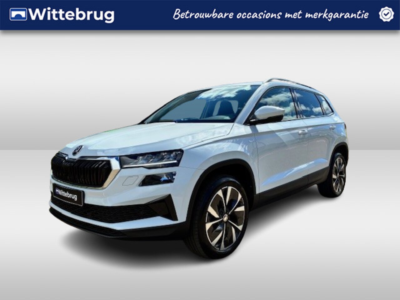 Skoda Karoq - 1.0 TSI Ambition / Elektr. Klep / NAVI / APP.Connect / CAMERA / 18"LMV - AutoWereld.nl