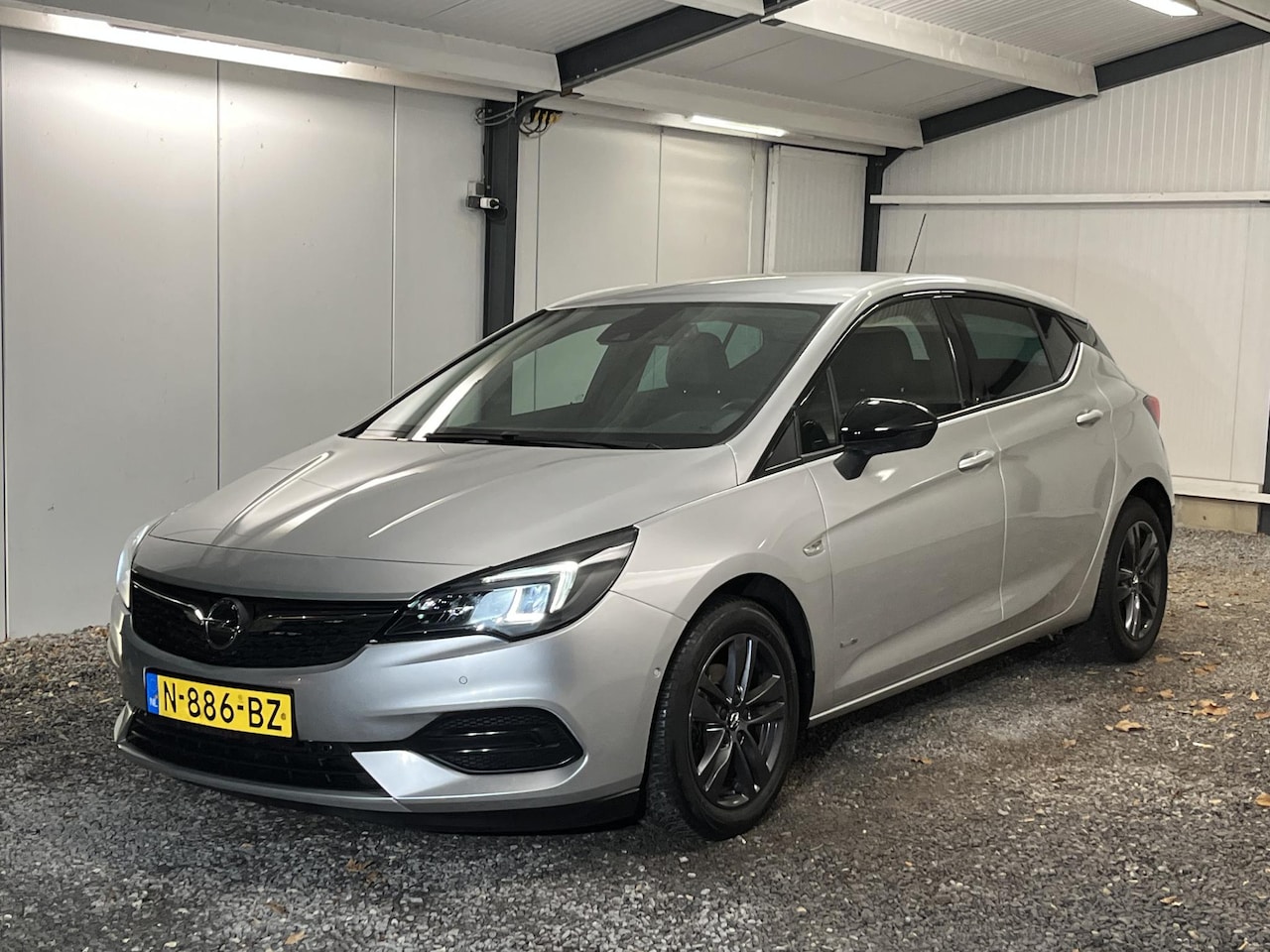 Opel Astra - 1.2 Design & Tech 110PK 9-2021 ECC NAVI LED ADAPT. PDC PARK ASSIST CAM DAB CARPLAY CRUISE - AutoWereld.nl