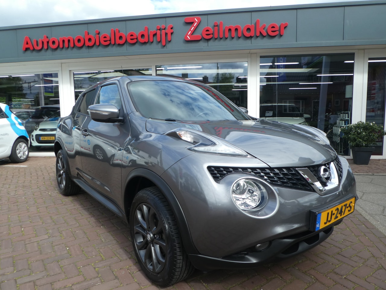 Nissan Juke - 1.6 N-Connecta Automaat, Navi, Camera, 17" LM Velgen - AutoWereld.nl