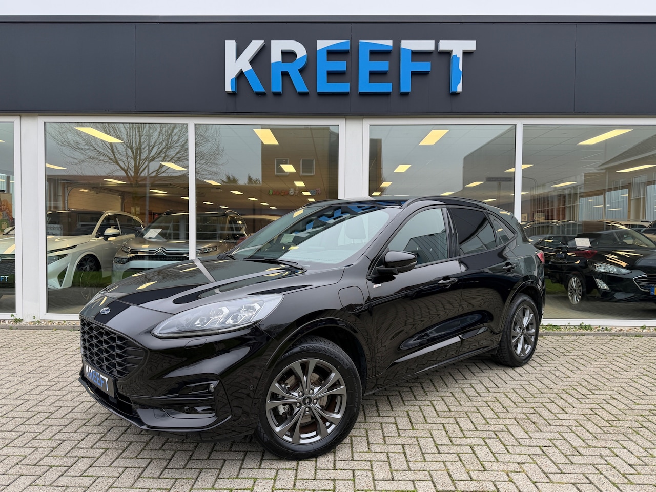 Ford Kuga - 2.5 PHEV ST-Line Winterpakket - AutoWereld.nl