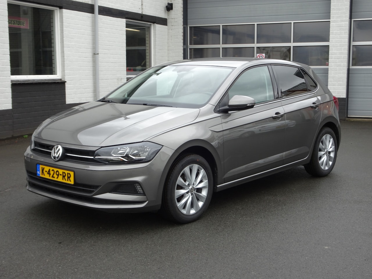 Volkswagen Polo - 1.0 TSI Comfortline Business Automatische airco, apple carplay, parkeersensoren, licht met - AutoWereld.nl