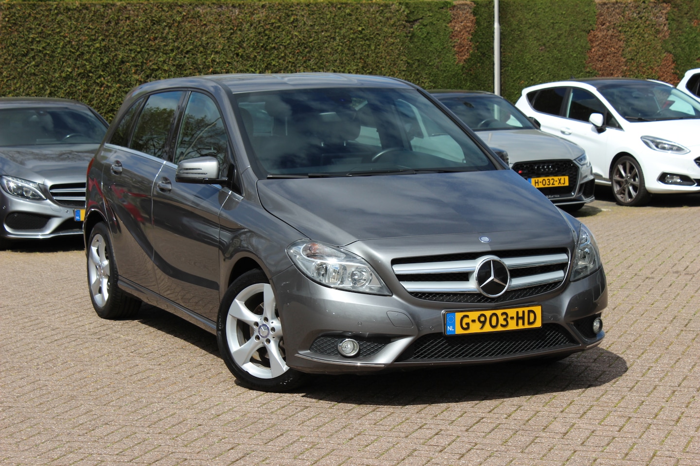 Mercedes-Benz B-klasse - 180 Prestige Automaat 84.874km! / Compleet onderhouden / CarPlay / Parkeerhulp V+A / 17'' - AutoWereld.nl