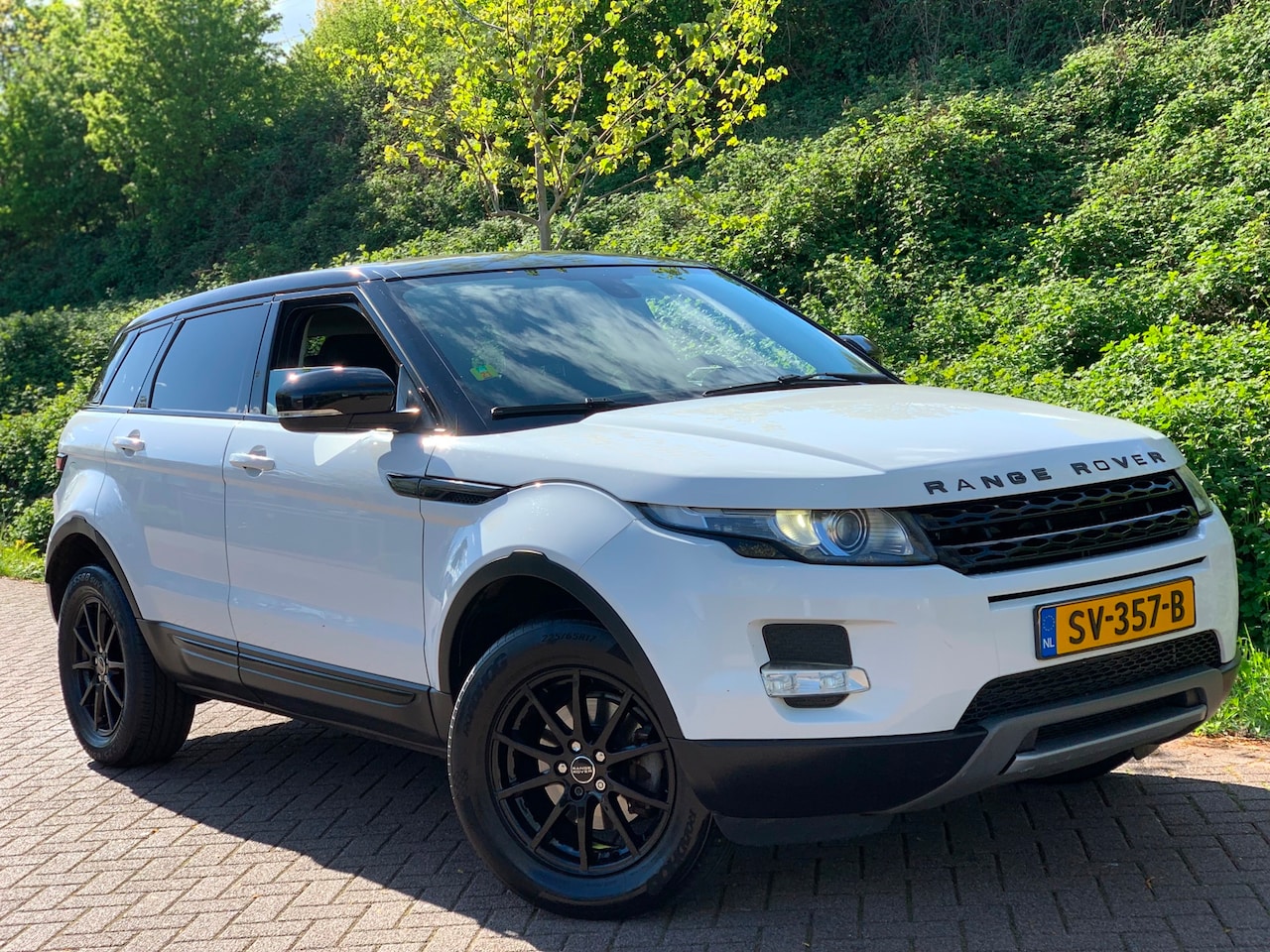 Land Rover Range Rover Evoque - 2.2 TD4 4WD Prestige 2.2 TD4 4WD Prestige - AutoWereld.nl