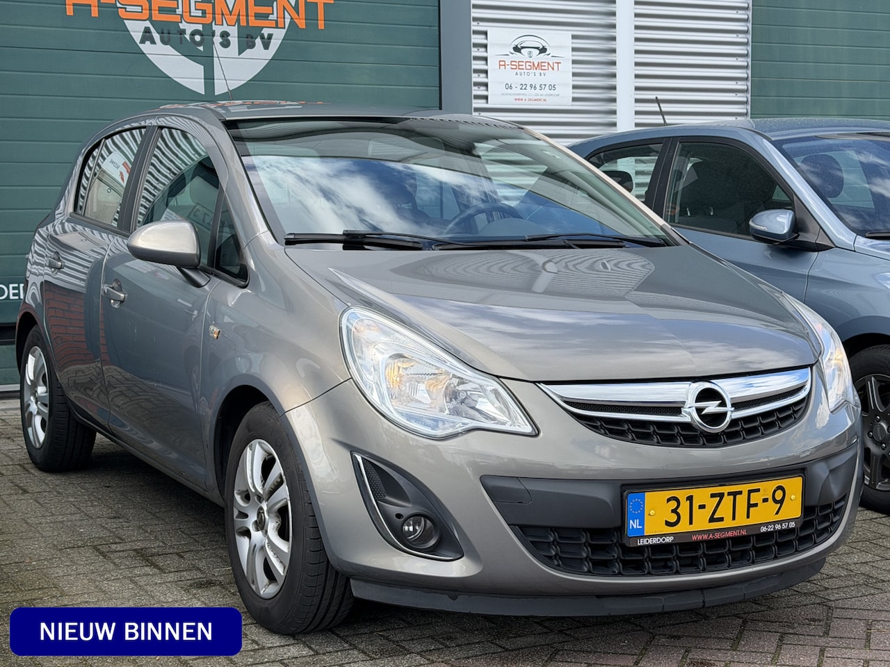 Opel Corsa - 1.4-16V Cosmo / Cruise / Winterpakket / Airco / NAP - AutoWereld.nl