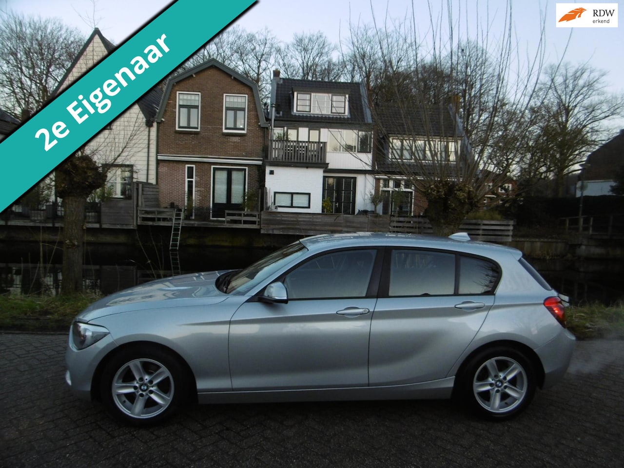 BMW 1-serie - 116i 5-deurs 136pk Airco PDC 2e eigenaar Zuinig A-Label - AutoWereld.nl