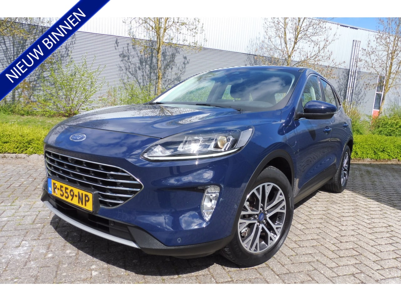 Ford Kuga - 2.5 PHEV Titanium Navigatie Camera v+a Trekhaak Parkassist enz. - AutoWereld.nl