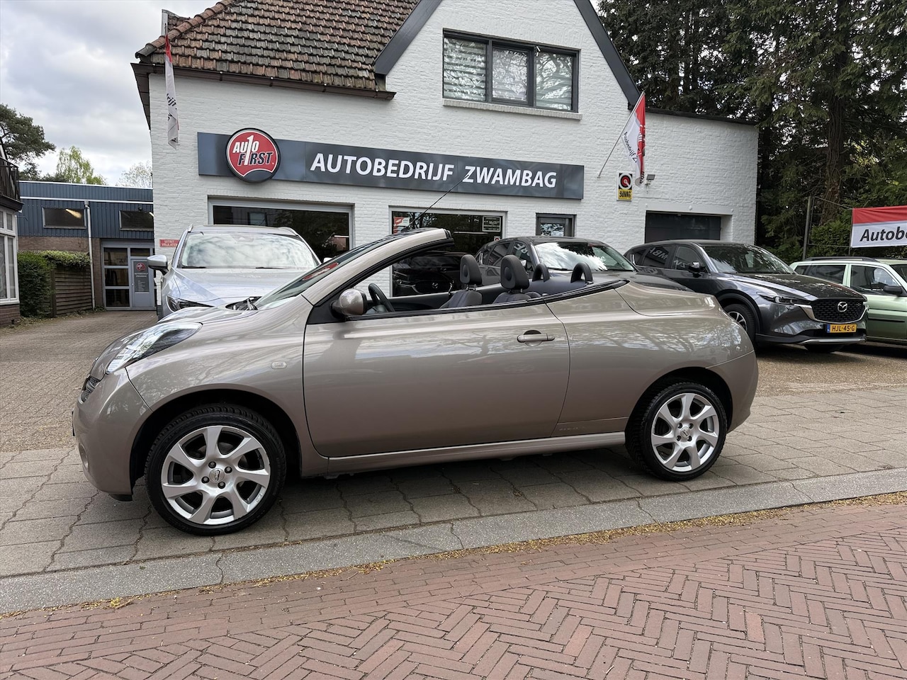 Nissan Micra - 1.4 Cabrio Tekna - AutoWereld.nl