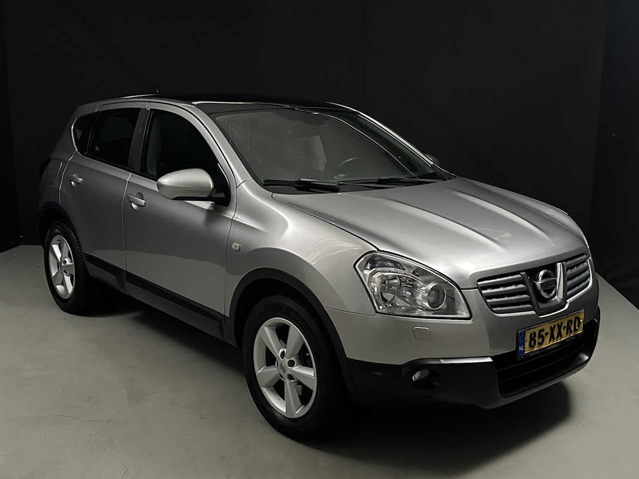 Nissan Qashqai - 2.0 Tekna Premium *Pano*Bluetooth*AC*Heatseat* - AutoWereld.nl