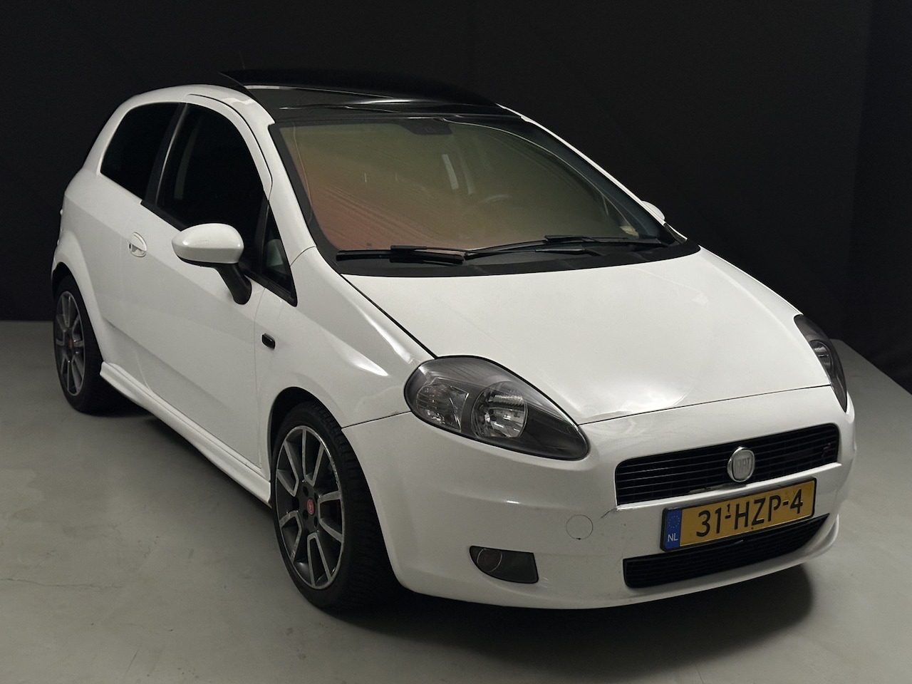 Fiat Grande Punto - 1.4-16V Sport *Navi*AC* - AutoWereld.nl