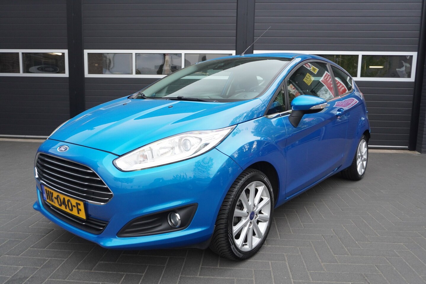 Ford Fiesta - 1.0 EcoBoost Titanium Airco/Cruise/Navi/Trekhaak - AutoWereld.nl